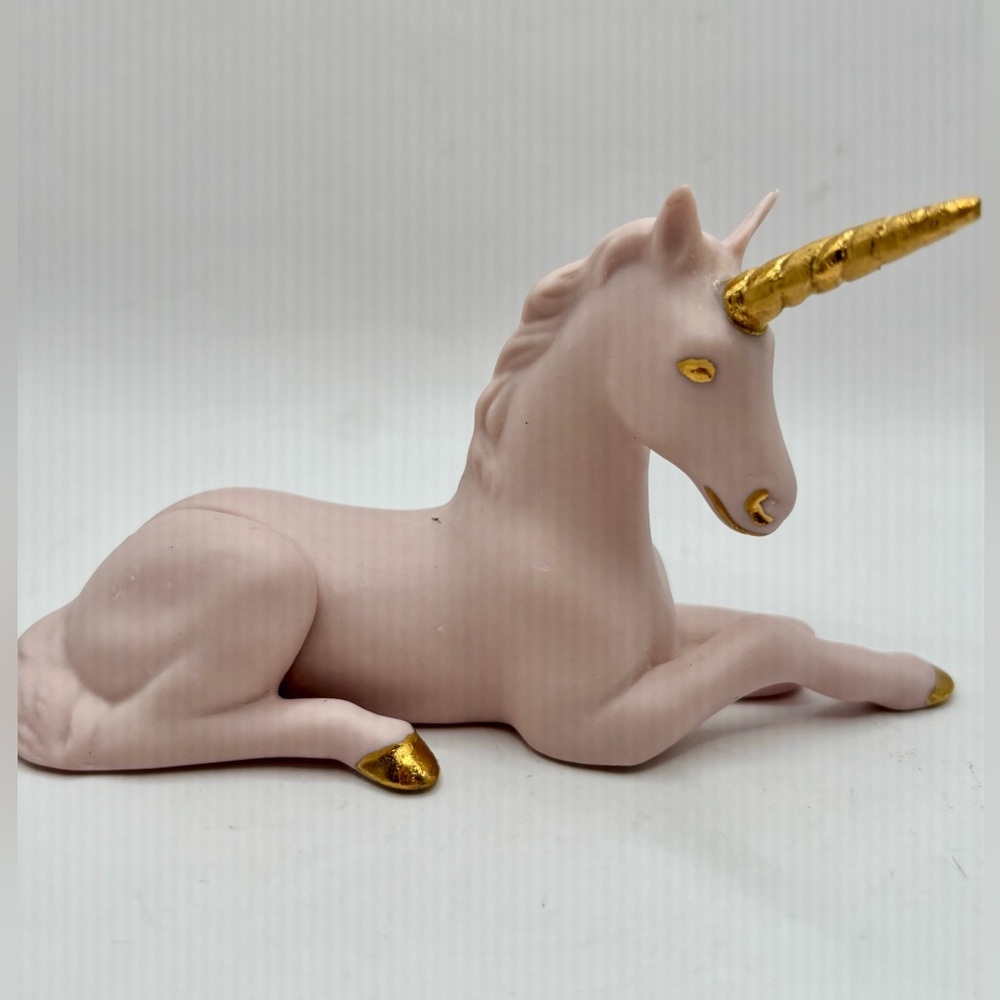 Unicorn Pink Porcelain Figurine with Gold Horn and hooves.